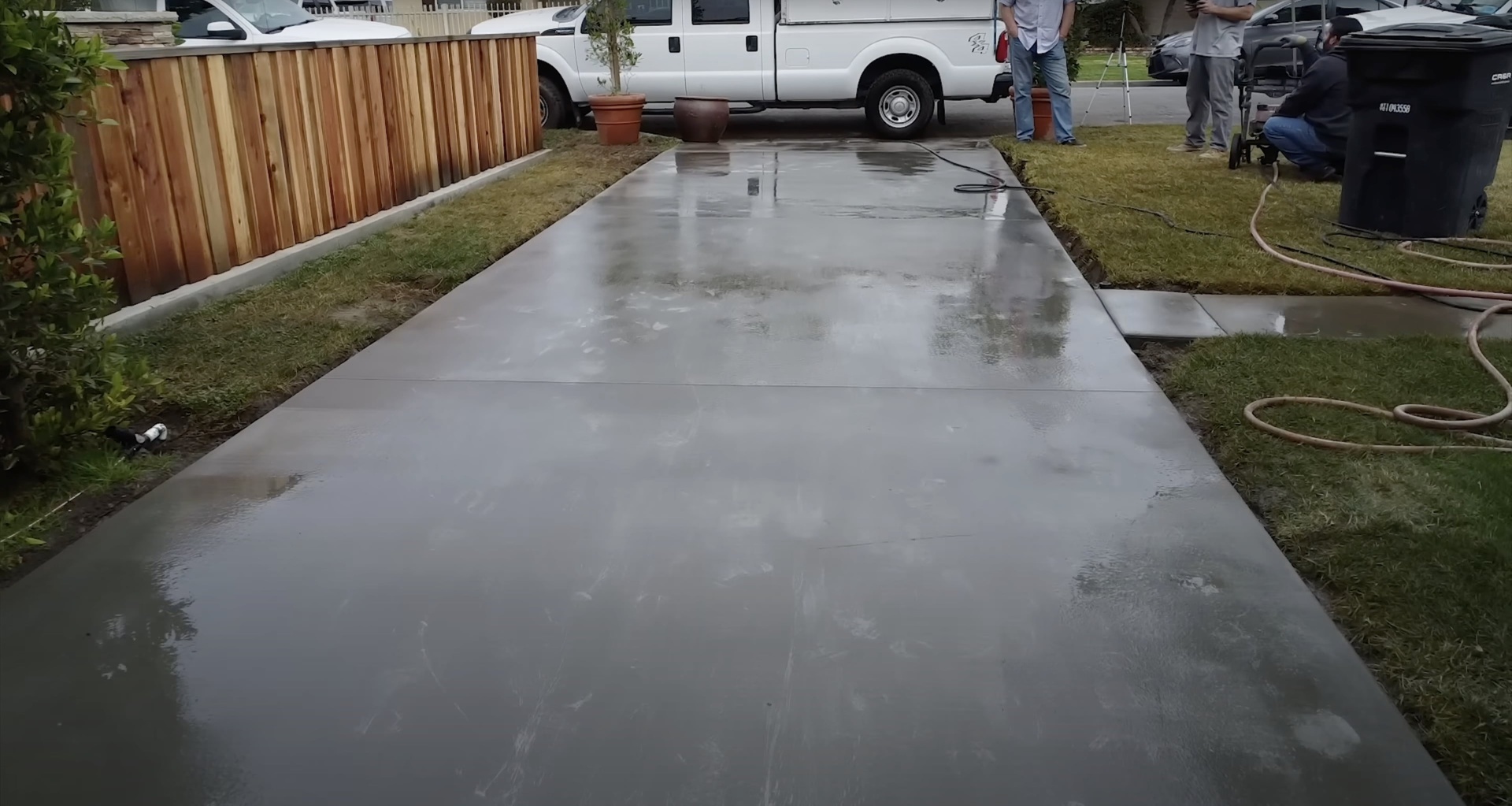 Professional concrete installation by Sunrise Concrete Construction Fresh concrete being poured and finished by professional contractors